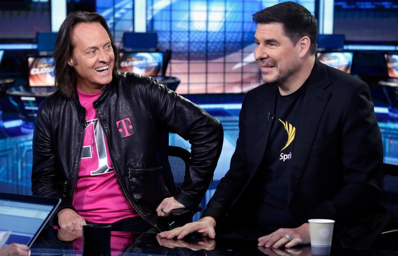 John Legere CEO de T-Mobile y Marcelo Claure CEO de  Sprint