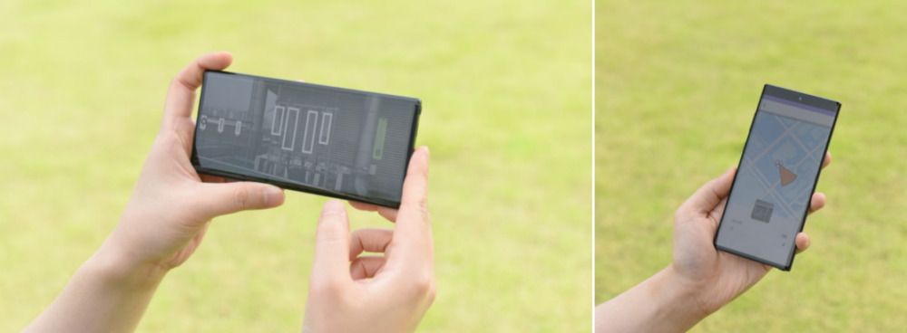Un ingeniero de Samsung está comprobando los resultados de la medición de la configuración de la antena en la pantalla del smartphone