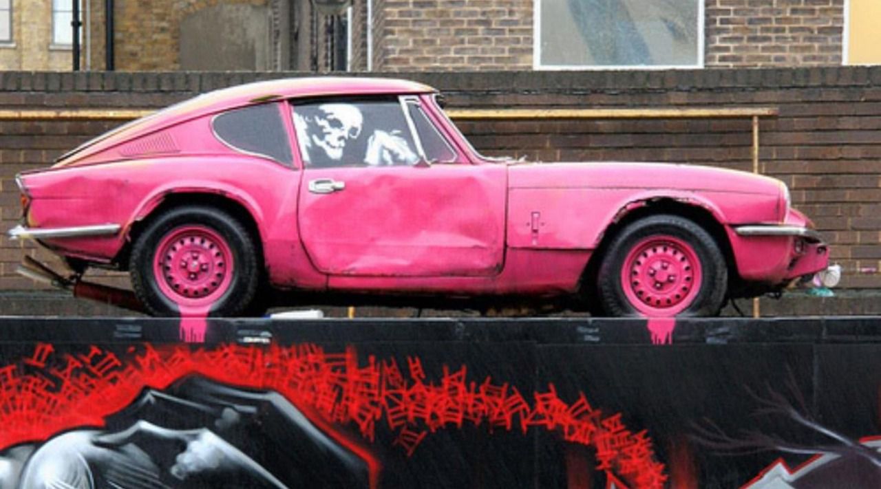 Obra de Bansky en Brick Lane, la calle de los graffitis, Londres